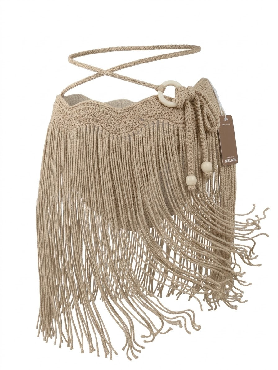 Falda mini tassel artesanal con ondas en pretina y bolas madera clara — MIZZBOGI Beachwear Colombia

Detalle de tejido artesanal con aro y bolas madera clara, falda tassel MIZZBOGI