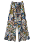 Pantalón PALAZZO 22’ de MIZZBOGI con estampado floral y paisley azul multicolor, piernas amplias y cordón delantero, vista frontal.