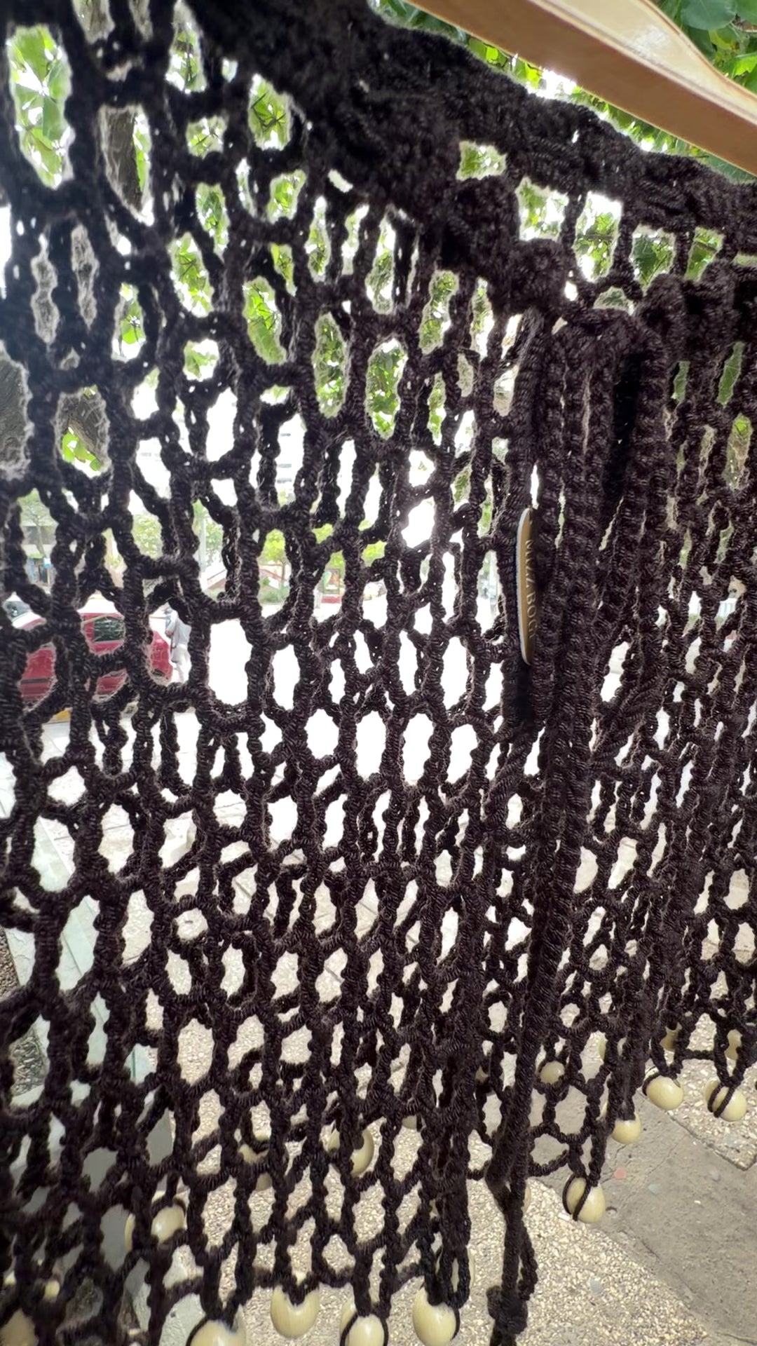 Minifalda ARUMA tejida en crochet calado con cuentas